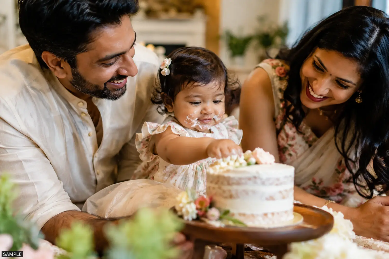 Child blowing out a single candle
